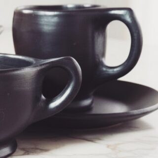 Something beautiful is brewing. ☕🖤

We’re giving you a sneak peek at the newest additions to the collection: our upcoming coffee cups and mugs.

Each piece is individually handcrafted, blending the raw, smoky texture of traditional black clay with a sleek, modern silhouette. They are currently finishing their journey through the kiln and will be ready to elevate your daily coffee ritual very soon.

Beautiful rituals take time, but we promise these are worth the wait. ✨

#AlunaMari #ComingSoon #BlackPottery #HandcraftedCeramics #CoffeeLovers #MugLife #ArtisanalDesign #SlowLiving